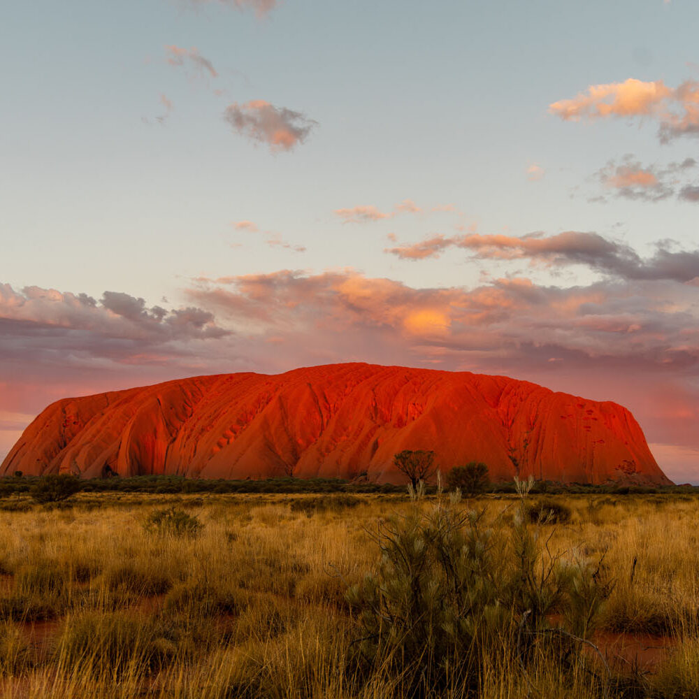 Uluru, or Ayers Rock, is a massive sandstone monolith in the heart of the Northern Territory's arid "Red Centre". Uluru is sacred to indigenous Australians and is thought to have started forming around 550 million years ago – Credit Tourism NT